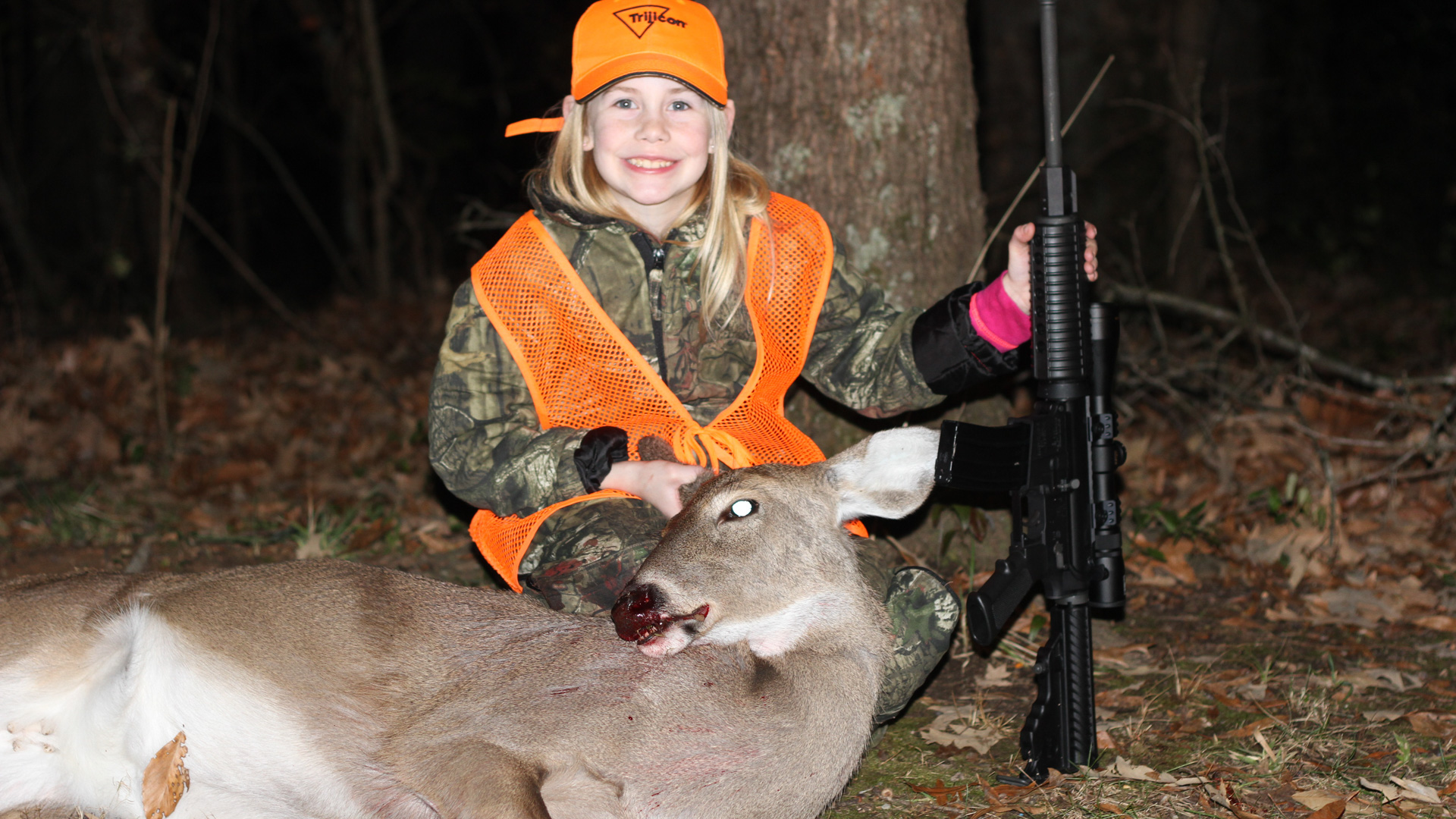 kid with deer